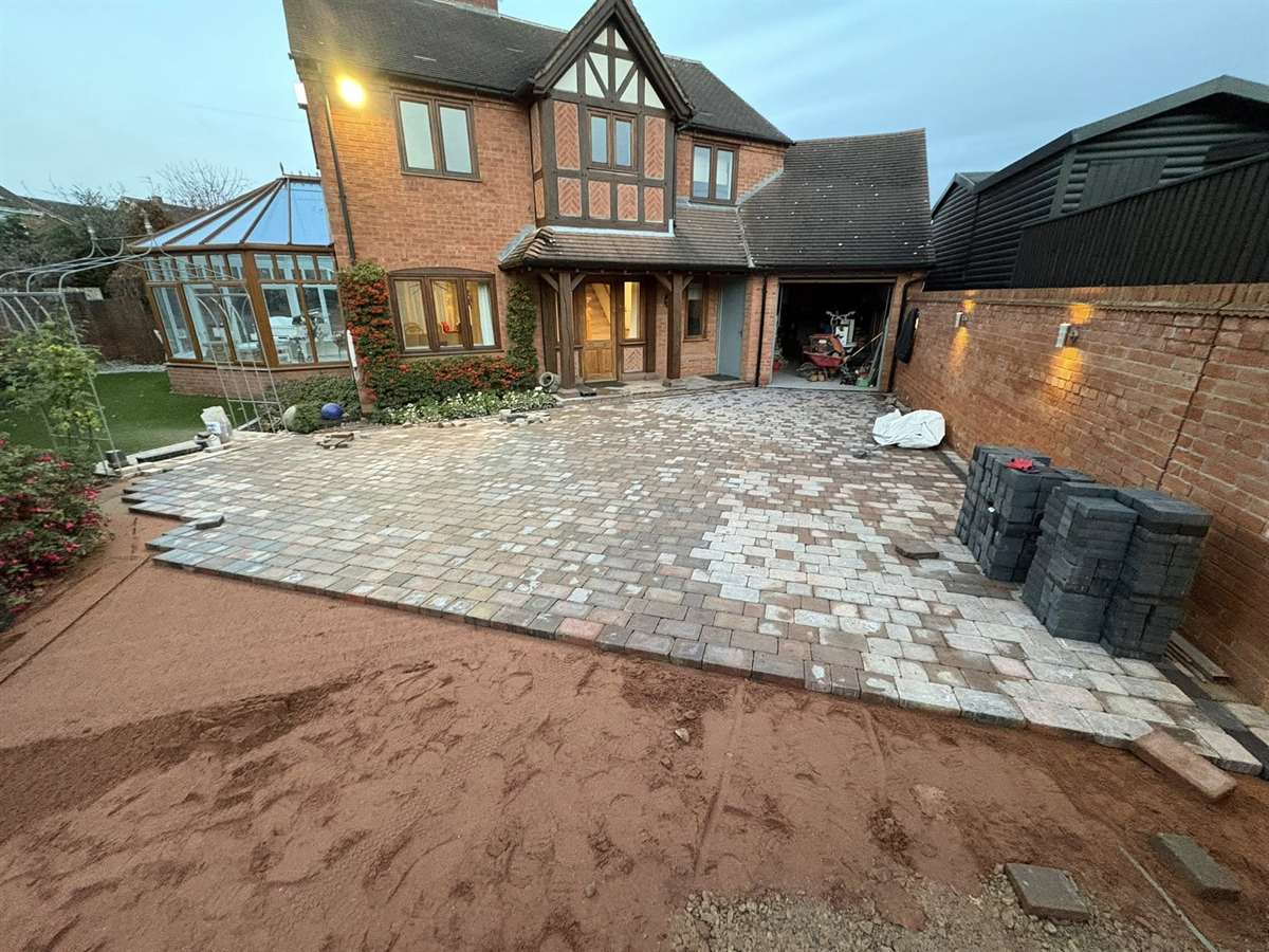 Tumbled block paving driveway being laid in Kingswinford